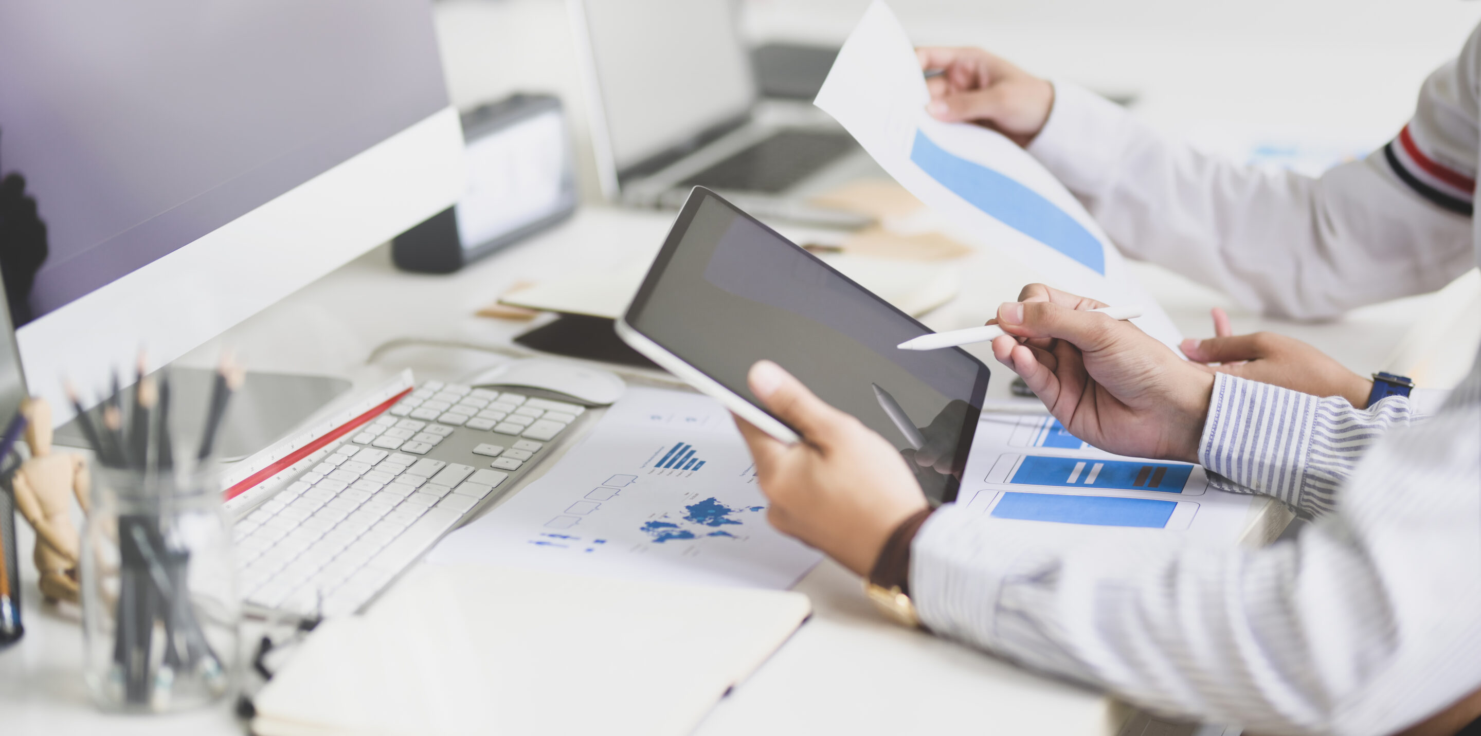 Young developer consulting their project