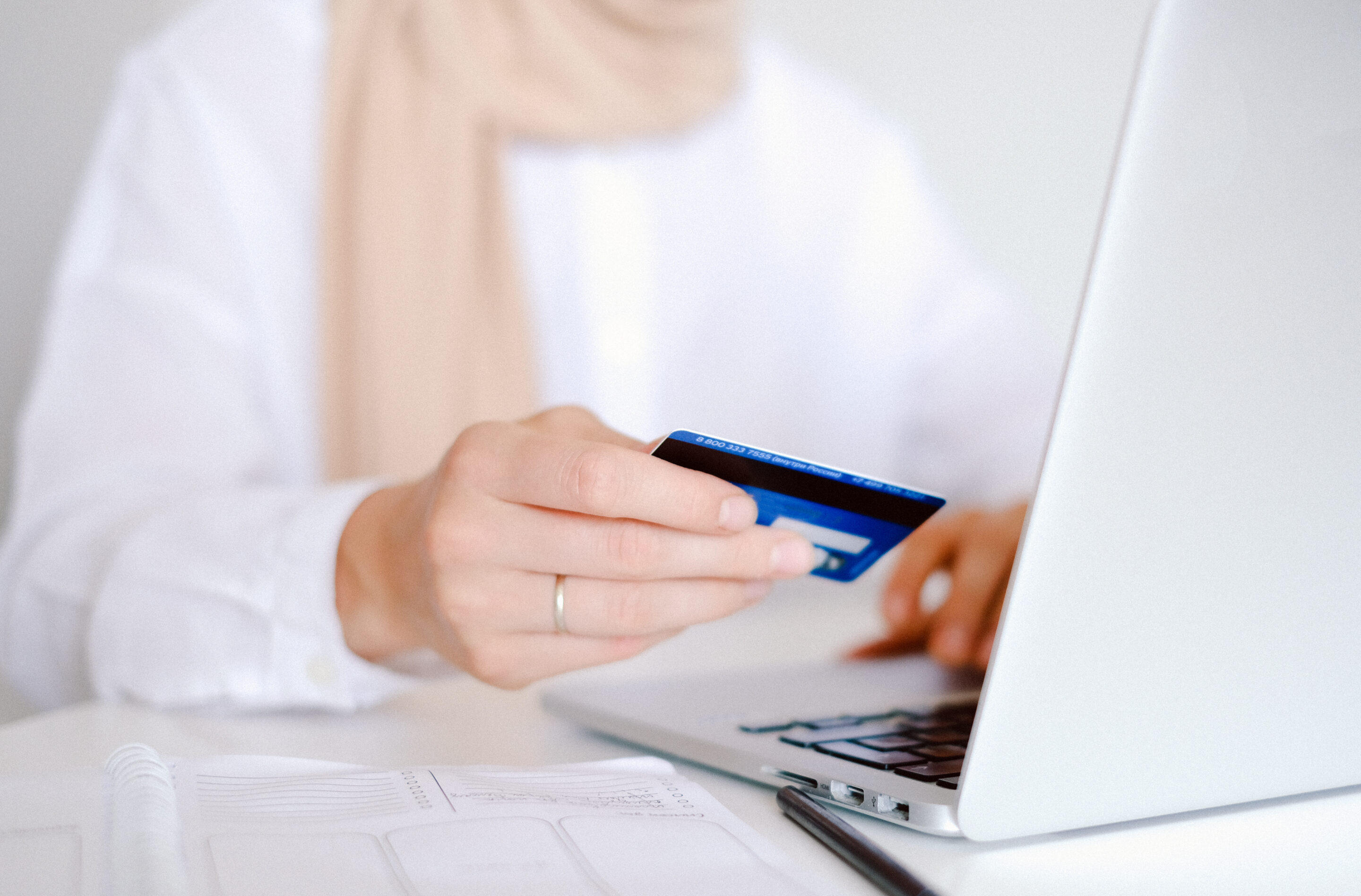 Canva – Person in White Long Sleeve Shirt Holding Credit Card