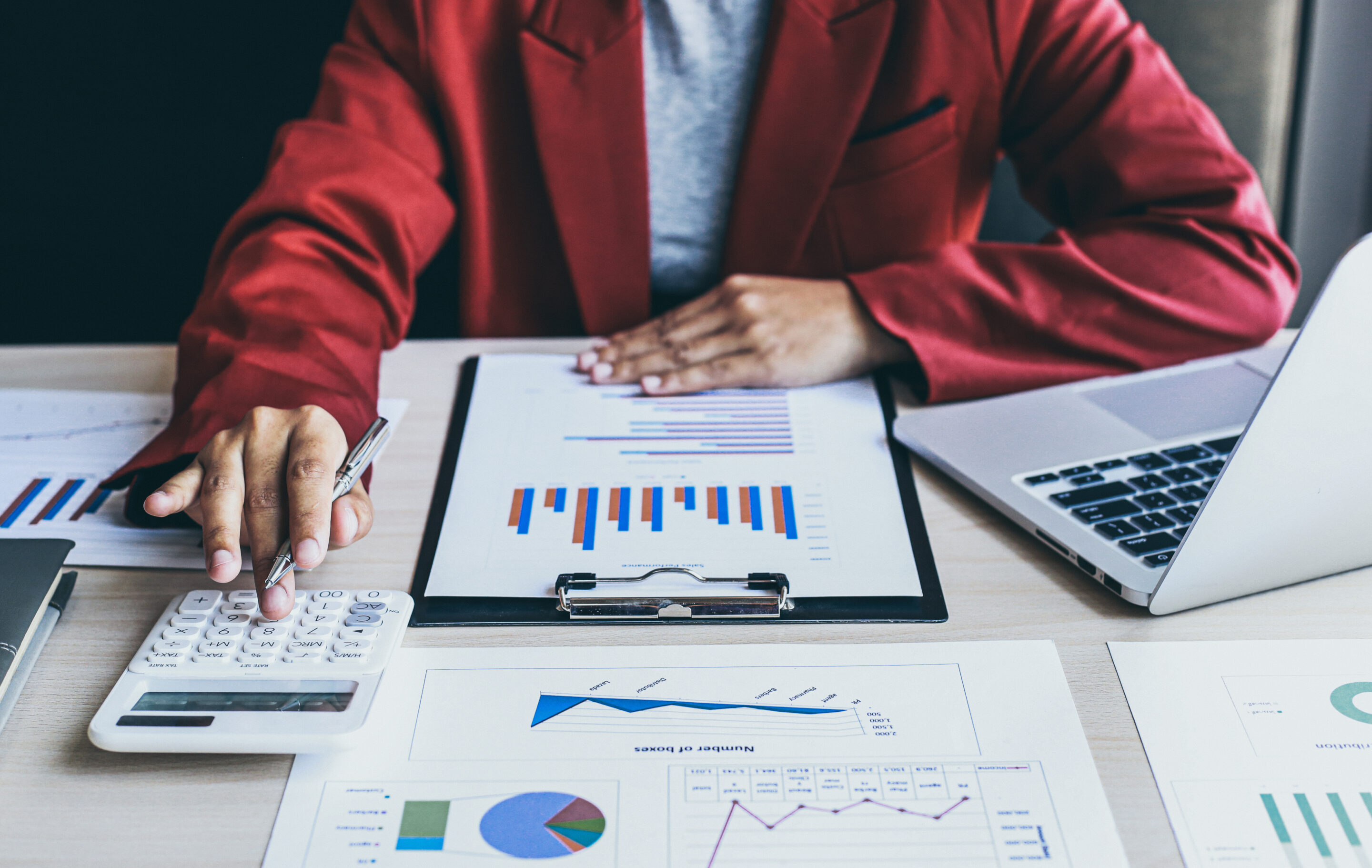 Canva – Male Hands Analyzing Graphs