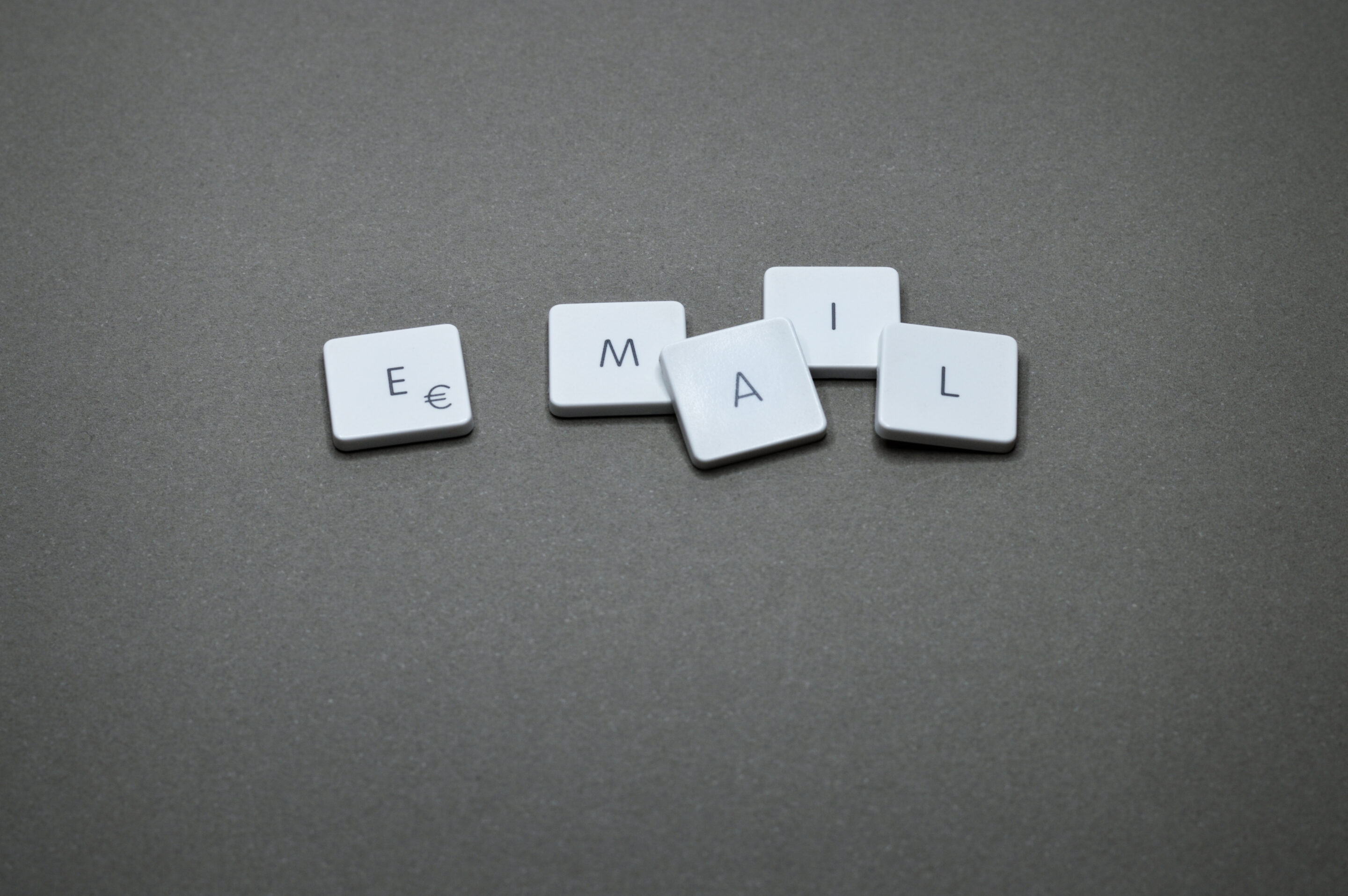 Keyboard keys on gray surface.