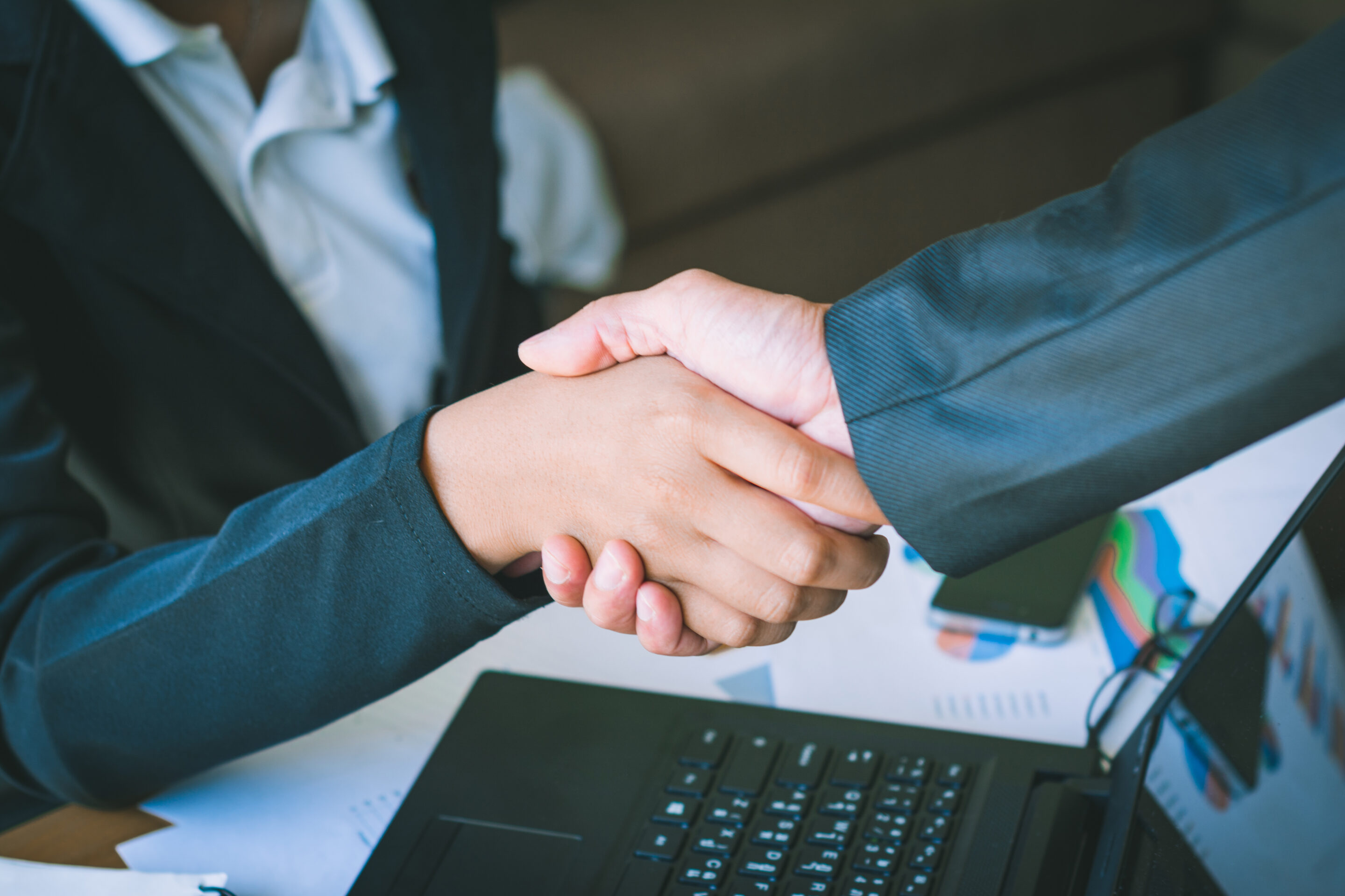 Businessmen connect business relations. Business man shaking hand with a partner.Businessmen are negotiating a business.