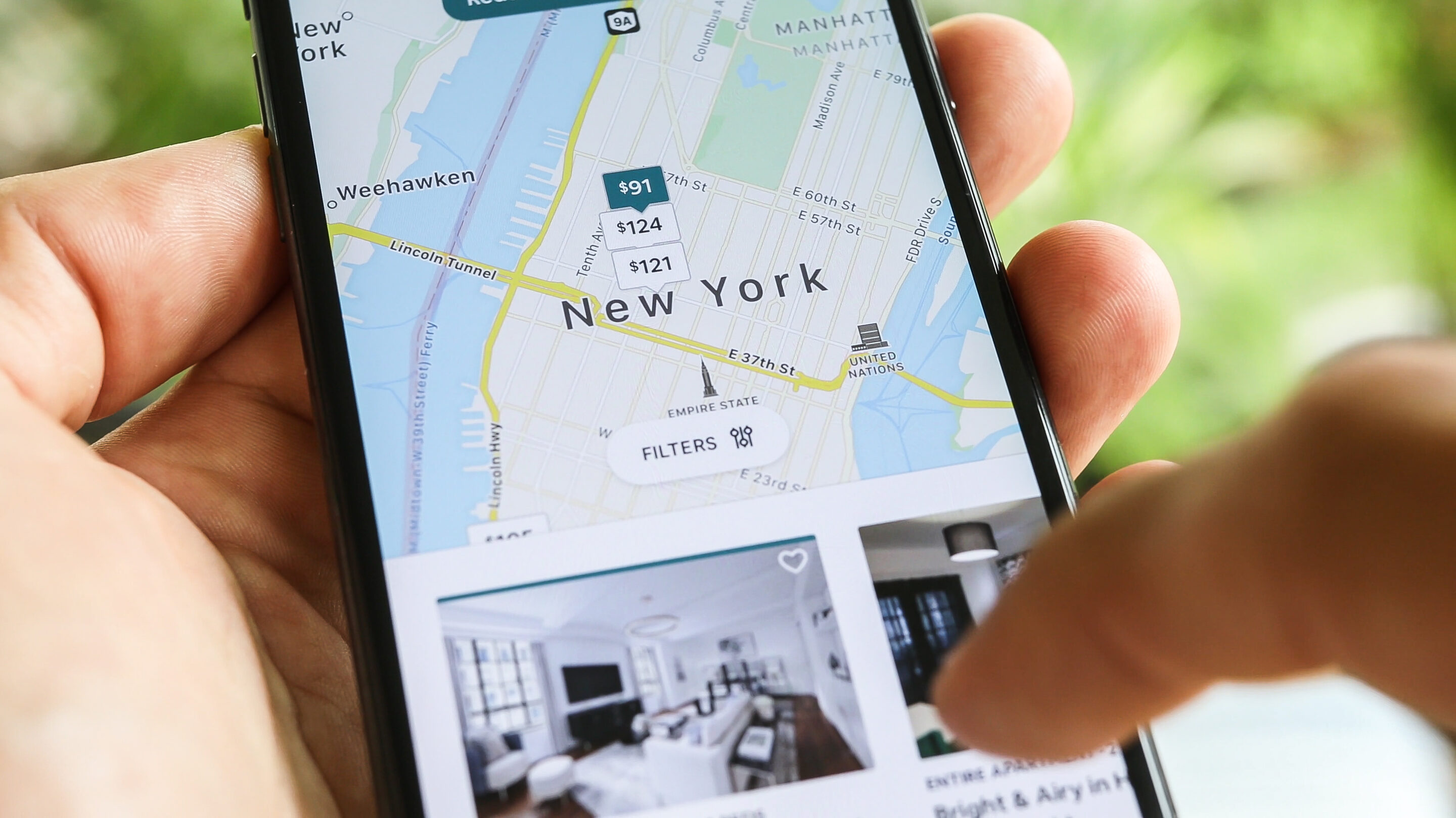 Woman trying to book home apartment romm in New York City